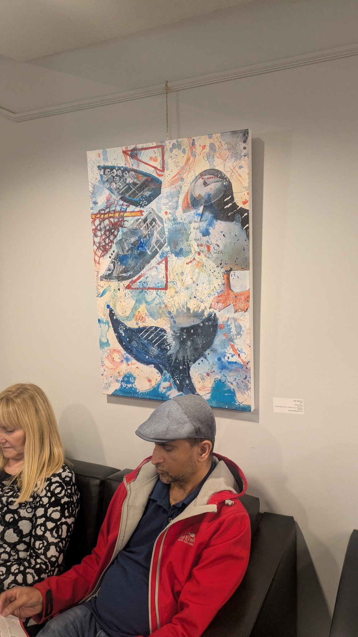 Dana Corkey in lemon-patterned jacket at art gallery